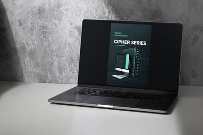 A gray laptop on a light gray surface with a hand resting on the trackpad. The laptop screen displays a digital template preview labeled tier name.